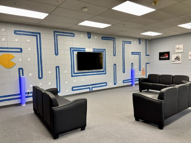The boys' living room with games and space to unwind
